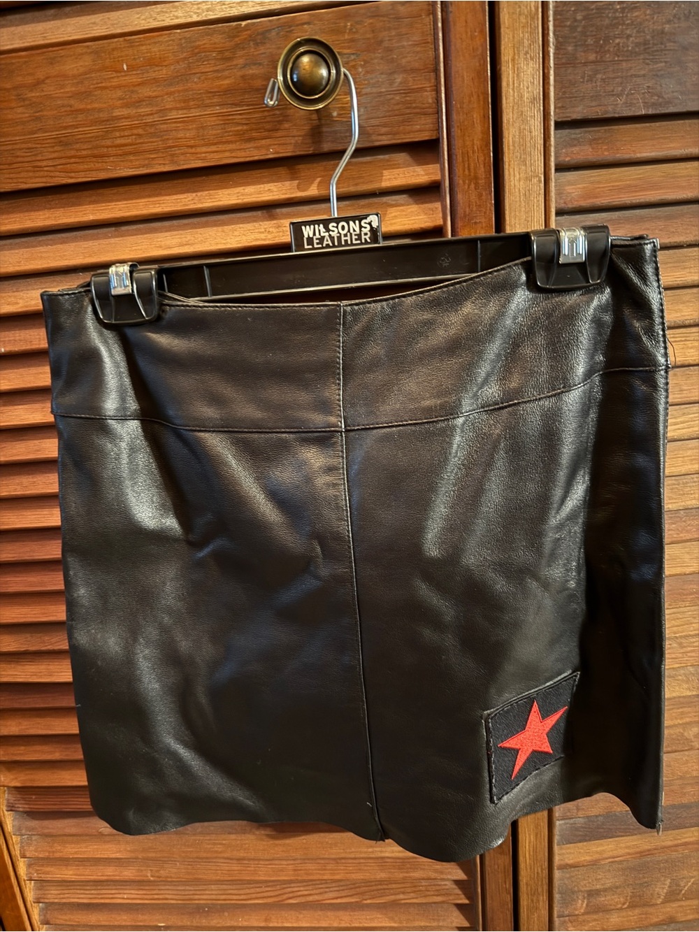 Wilsons Leather Black Mini Skirt with Red Star Patch